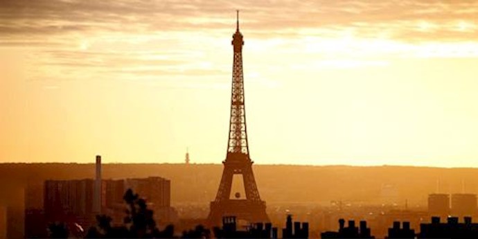  'The Eiffel Tower is seen at sunset in Paris, France, November 22, 2015'