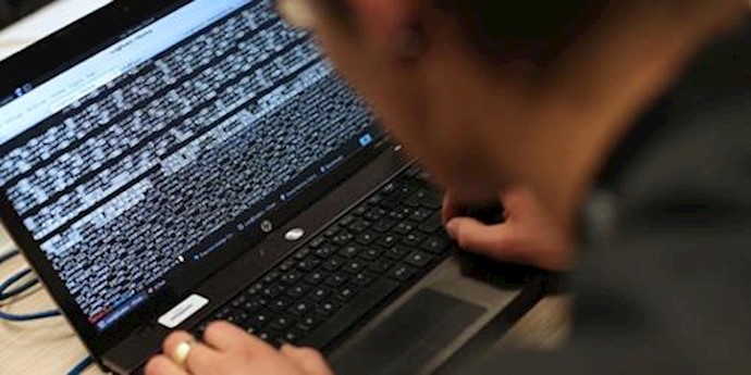 UK to double cyber-security funding, push Syria vote post-Paris