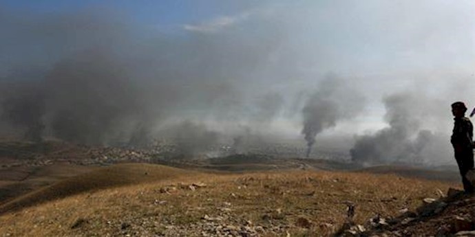  'Smoke rises from the site of U.S.-led air strikes in the town of Sinjar, Iraq November 12, 2015 '