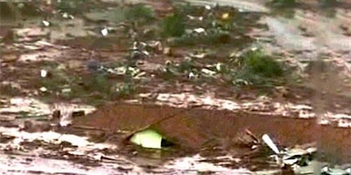 Dam break sweeps away homes in Brazil, killing at least 1 person