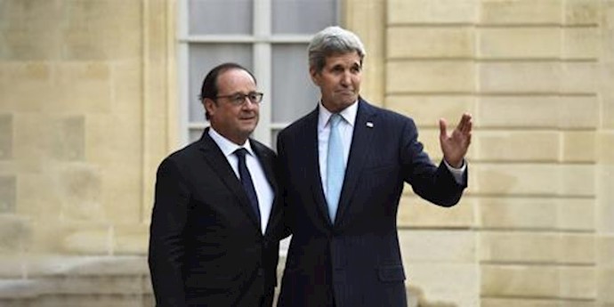  'French President Francois Hollande and U.S. Secretary of State John Kerry upon his arrival for the talks at the Elysee palace in Paris on Nov'