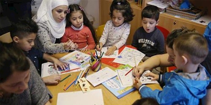  'Children study in Berlin as part of Germanys Reading Start for Refugee Children initiative'