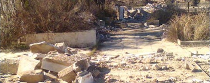  'Iranian backed militias destroying Camp Ashraf cemetery '