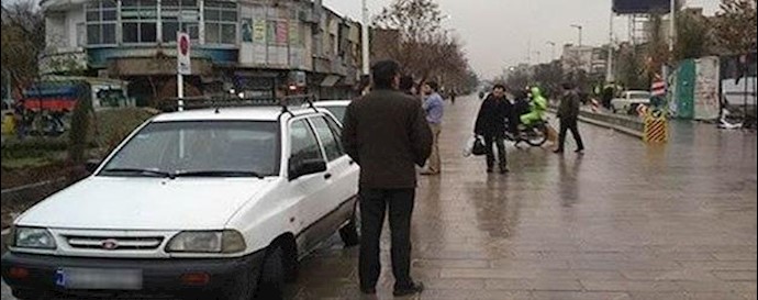 Tehran: Chastising a plain cloth security agent in Shohada Square