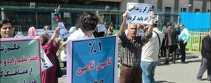  'Workers demonstrate outside parliament in Tehran'