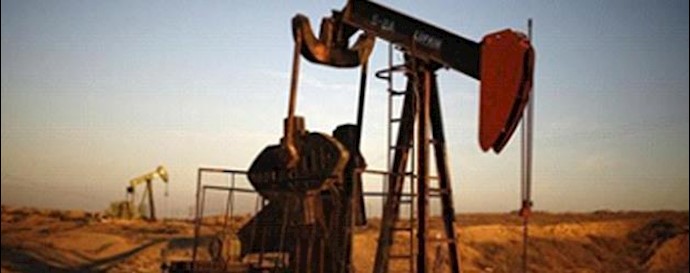  'Pump Jacks are seen at sunrise near Bakersfield, California October 14, 2014.'