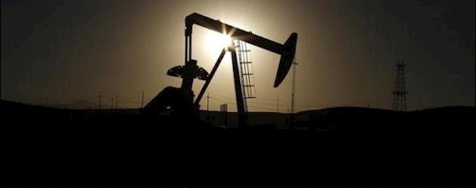  'A pump jack is seen at sunrise near Bakersfield, California October 14, 2014'