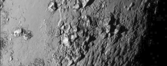 Tiny Pluto sports big mountains, New Horizons finds