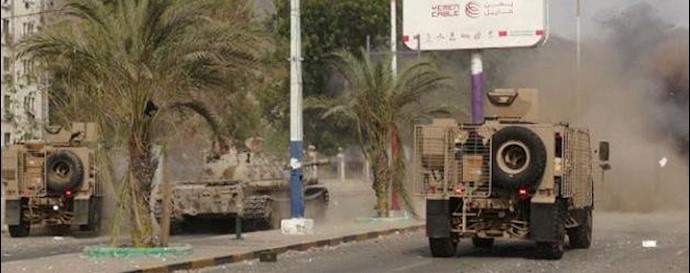  'Military vehicles of the Southern Resistance fighters on a street in the city of Aden July 17, 2015'
