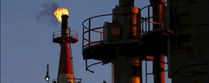  'A flame shoots out of a chimney at a petro-industrial factory in Kawasaki near Tokyo '