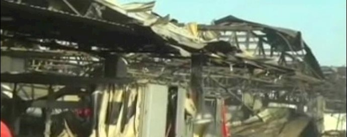 Iraq officials: Huge truck bomb in Baghdad market killed 62