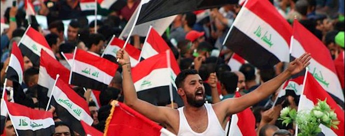  'Iraqi demonstrators waving the national flag turned out on Friday in Baghdad to support Prime Minister Haider al-Abadi’s government overhaul'