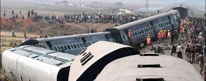 Two trains swept off flooded bridge in India