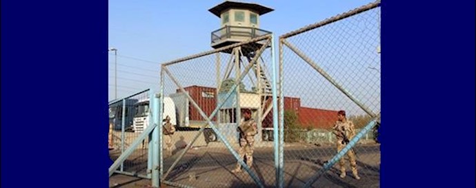  'Iraqi security forces stand guard at Umm Qasr port near Basra, southeast of Baghdad'