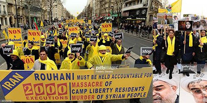 Protesters march, France eyes business deals as Iran’s Rouhani visits