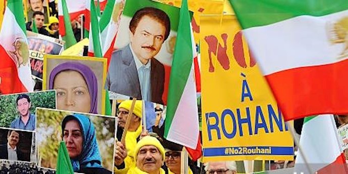  'Protests greet Iranian president in Paris'