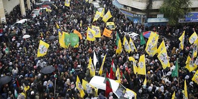 Thousands of Palestinians demonstrate in Hebron during a funeral procession