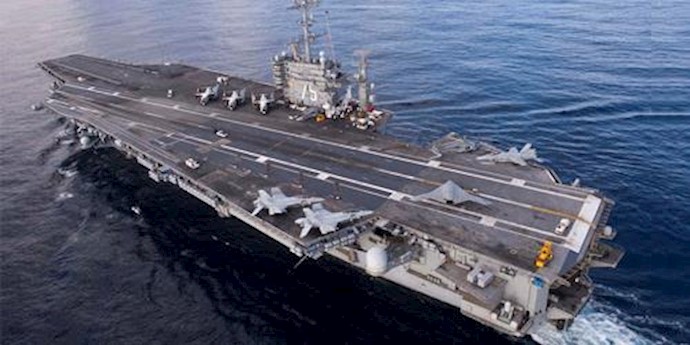  'The X-47B Unmanned Combat Air System (UCAS) demonstrator taxies on the flight deck of the aircraft carrier USS Harry S'