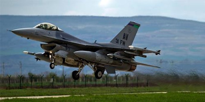  'A U.S. F16 fighter jet takes off from a Romanian air base in Campia Turzii, Romania'