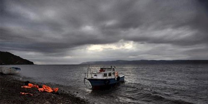  'Life jackets are left on the beach after a group of refugees and migrants arrived on the Greek island of Lesbos'