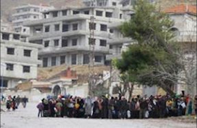 Medics race to save starving Syrians in besieged town