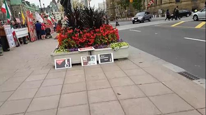 MEK protest the murder of 30,000 by the Ayatollah regime at Parliament Hill