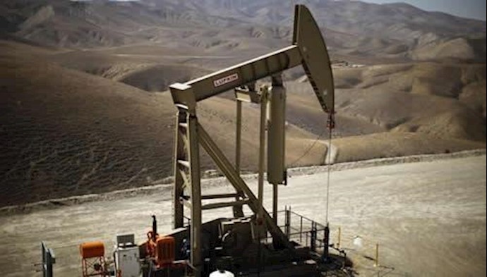 Oil ends lower on U.S. trade spike; shale decline limits losses