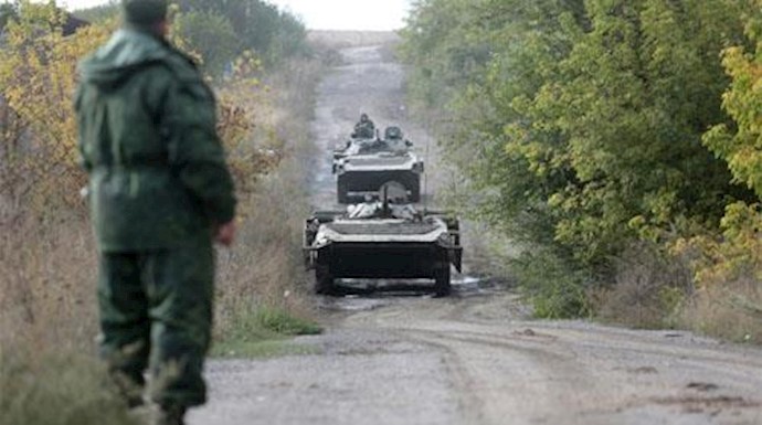  'Fighting in east Ukraine -- which has claimed nearly 10,000 lives -- has dragged on despite a peace plan brokered by Germany and France'