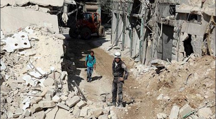 'A site damaged by an airstrike in the besieged rebel-held al-Qaterji neighborhood of Aleppo on Oct. 11. U.K'