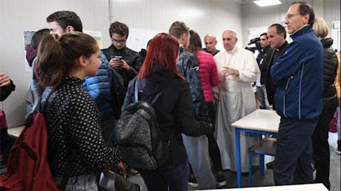 Pope Francis makes surprise visit to quake zone