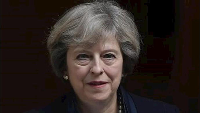 May says to trigger EU divorce by end of March, sterling falls