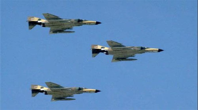  'Iranian air force fighter jets fly over Tehran'