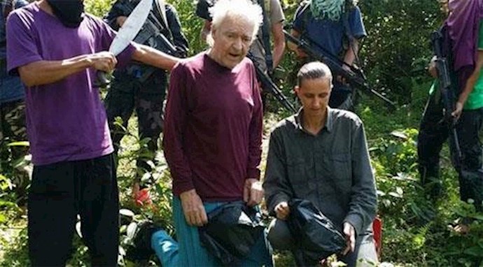 The Philippines says German killed on yacht, companion may be Abu Sayyaf hostage