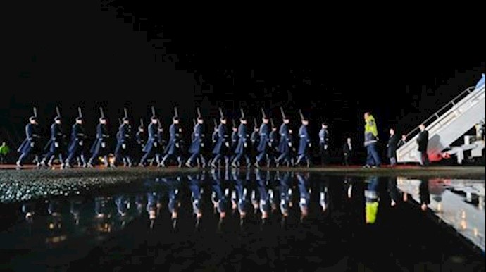  'German honor guard march across the tarmac for the arrival ceremony for President Barack Obama at Airport in Berlin, Wednesday, Nov. 16, 2016'