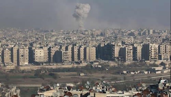  'Smoke rises from a rebel-held area of Aleppo, Syria December 9, 2016.'