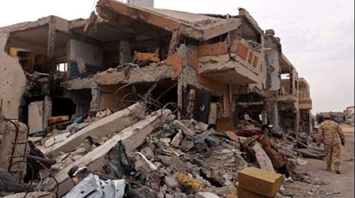  'A member of the Libyan forces of the National Accord (GNA) patrols Sirtes Al-Giza Al-Bahriya district on December 20, 2016 '