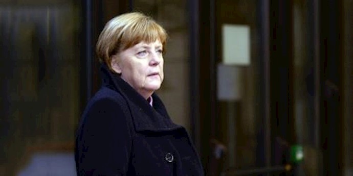 Merkel calls mob that screamed at migrants repulsive