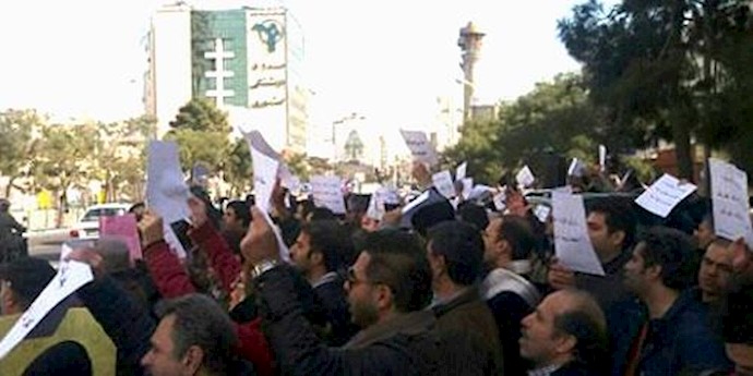 Iranians losing money and share of a northeast company, rally in Tehran