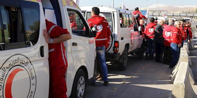 Convoy of aid enters besieged Syrian town