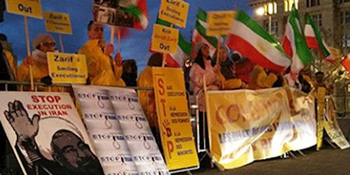 Iranian ex-pats in Brussels protest Zarif visit to Belgian