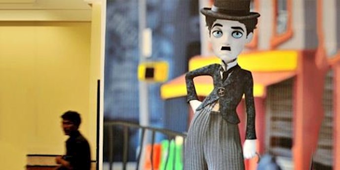  'A cutout showing an animated likeness of Charlie Chaplin'