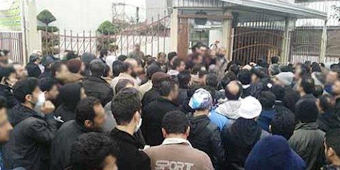 Textile company workers rally in northern Iran