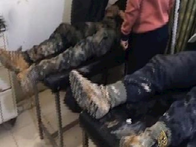 Dropping Barrel Bombs Containing Poisonous Chlorine Gas on the Syrian town of Moadhamia-Sham