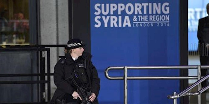  'Police office stands guard during a donors conference for Syria at the Queen Elizabeth II Conference Centre in London Britain'