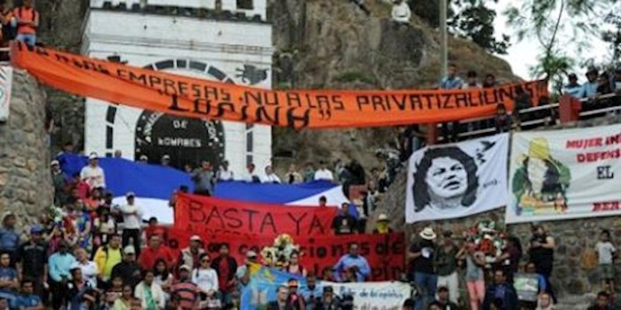  'People attend the funeral of murdered indigenous activist Berta Caceres and call for justice in La Esperanza, Honduras on March 5, 2016'