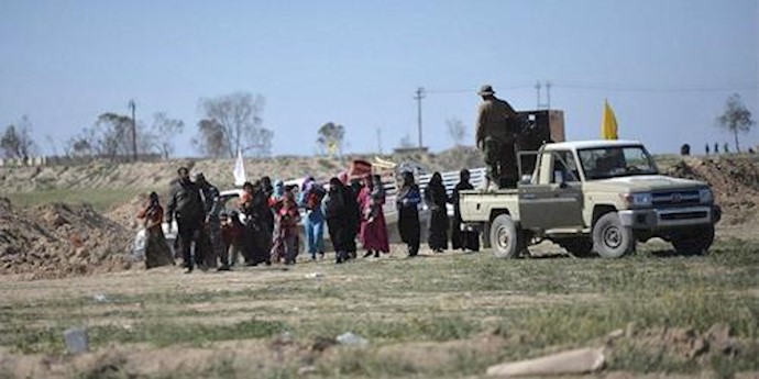  'Thousands of civilians have been fleeing Hit, west of Baghdad, as security forces close in on fighters from ISIS hunkered down in the city '