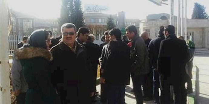 Workers rallying, on strike in two western Iran cities