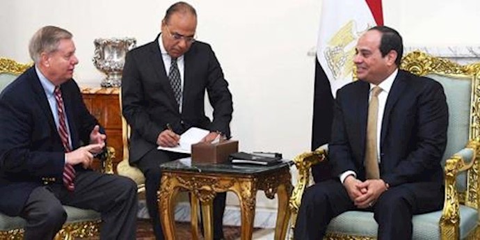  'Egyptian President Abdel-Fattah el-Sissi meets with Republican Sen. Lindsey Graham at the office of the presidency in Cairo.'