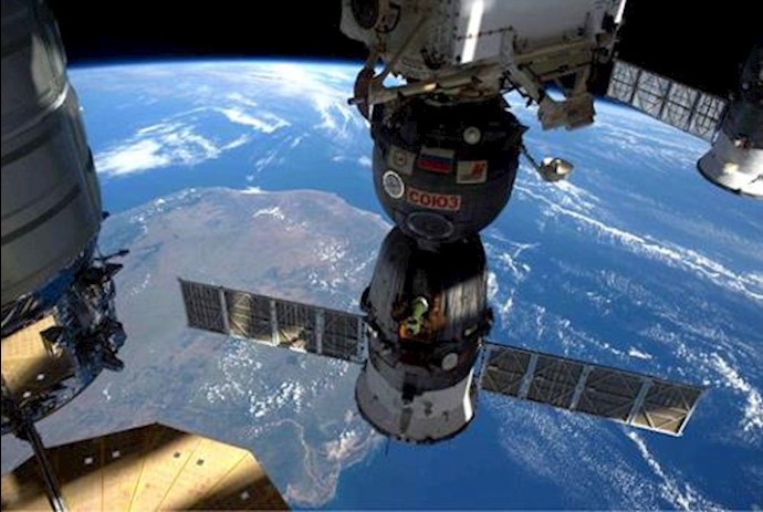 SpaceX unmanned Dragon cargo ship arrives at space station