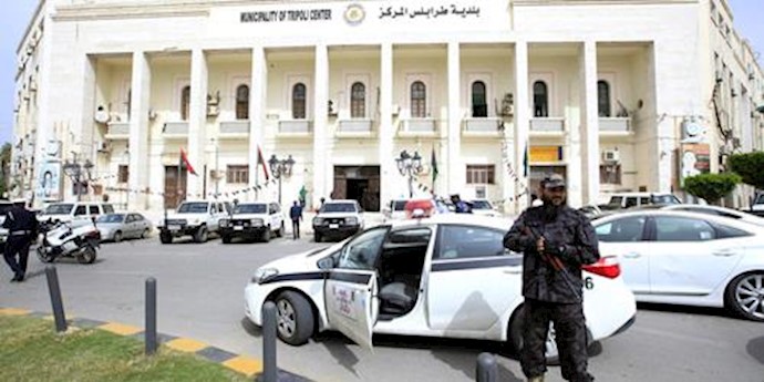  'Military police guarding the headquarters of the municipal council of Tripoli in Tripoli, Libya, April 5, 2016'